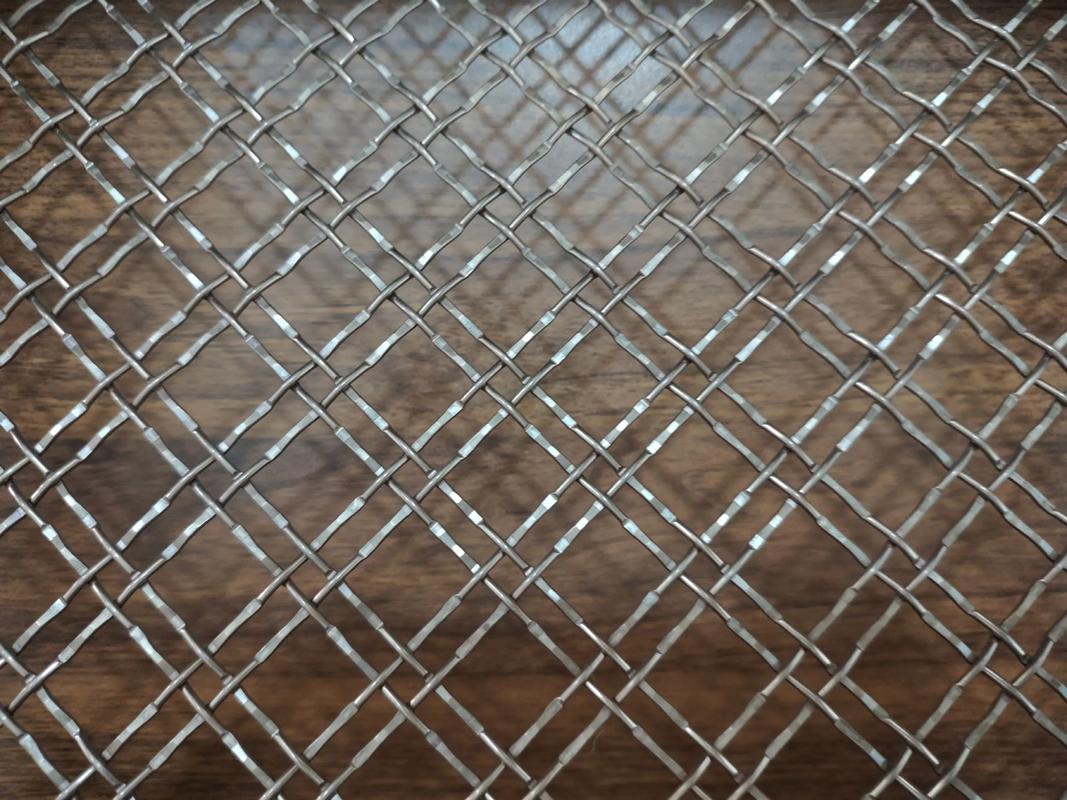 金屬編織藝術(shù) 不銹鋼屏風(fēng)、幕墻、吊頂與隔斷的多樣裝飾應(yīng)用